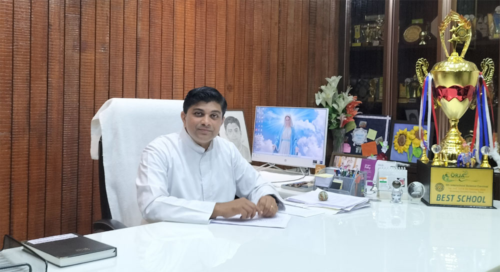 Fr. Jinto Kallukaran CMI, Principal